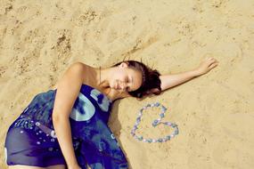 Girl Model lying on Beach