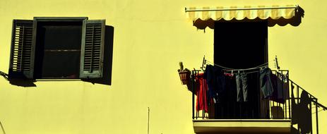 Beautiful building with Mediterranean balcony, in light