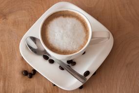 teaspoon next to the coffee