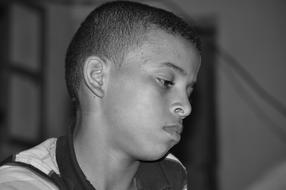 monochrome photo of sad african boy