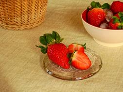 sliced juicy strawberries in a plate
