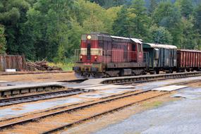 the old train runs on the tracks