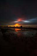 dark twilight over fields in the countryside