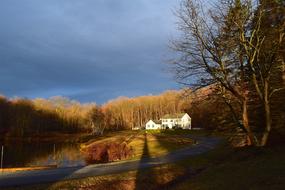 House in forest and Sunrise Sky