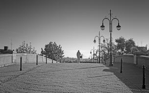 black and white, man on the bridge in peremyshl, Poland