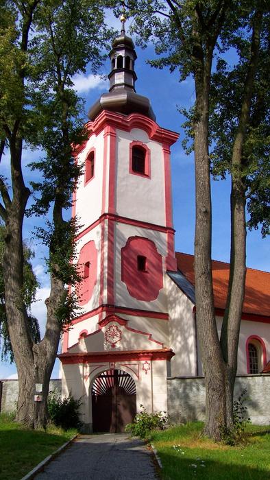 red and white church with a spire
