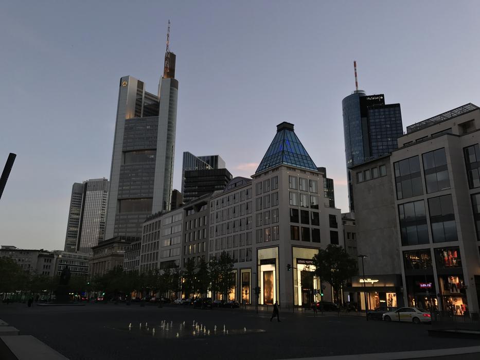 buildings in the financial district of Frankfurt against the backdrop of the night sky