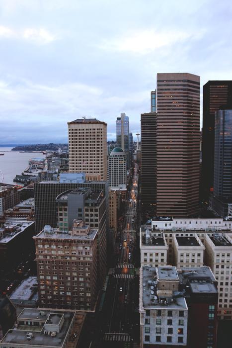 Cityscape of Seattle, USA, under the blue sky with white clouds