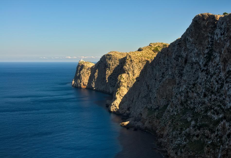 green mountains with sea