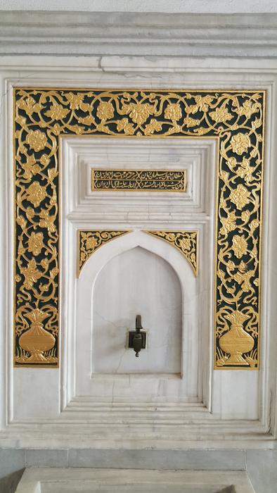 Beautiful, white and gold fountain in Topkapı, in İstanbul, Turkey