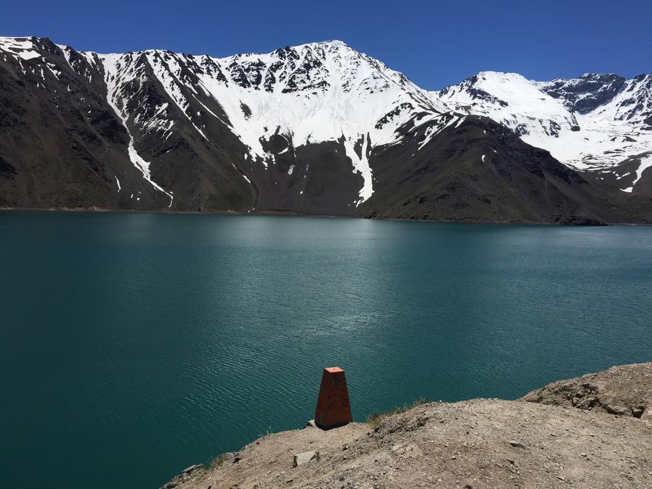 blue lake with a mountain backdrop