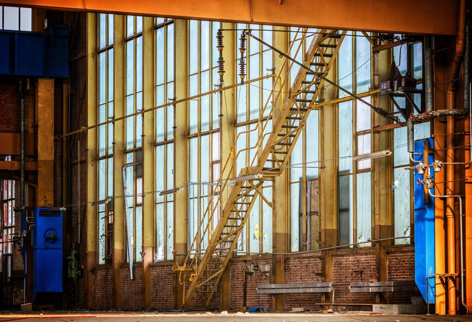 Interior of the factory with colorful constructions and stairs