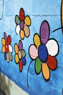 Close-up of the painting of the colorful and beautiful flowers on the wall