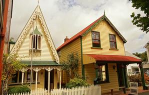 Colorful houses among the plants, on the street in New Zealand