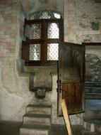 Interior of the old building with window and stairs