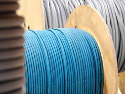 photo of a blue cable on a drum