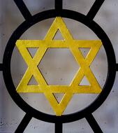 golden star of david on the fence