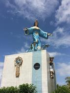 blue sculpture on the roof