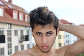young arabic man on blurred background