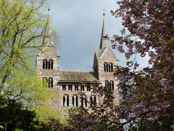 the church is beautiful by the trees