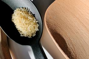 rice grains in spoonful