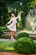 Girl and Nature trees in garden