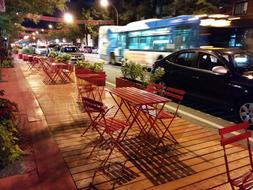 cars passing through the cafe