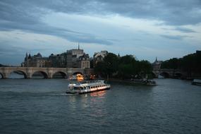 Seine Paris Boat at evening