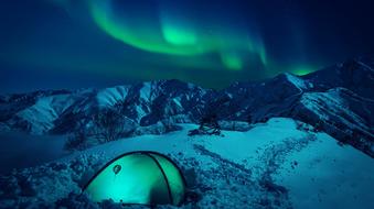 green tent in white snow