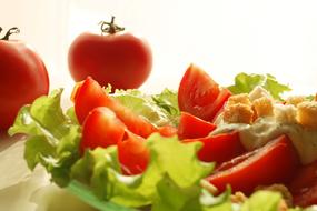 fresh tomatoes in a salad