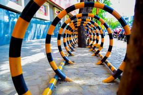 orange black Circles, bicycle parking in city