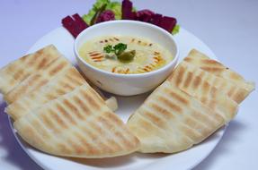 fried pita bread with sauce