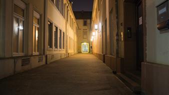 Cityscape of the town with buildings and lights, in the evening