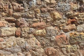 Close-up of the old, colorful, Medieval wall