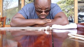 African American sitting at the table