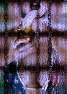 Girl with banana against a background of water drops