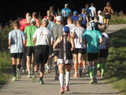 Group of caucasian people Jogging away