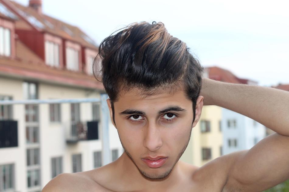 young arabic man on blurred background