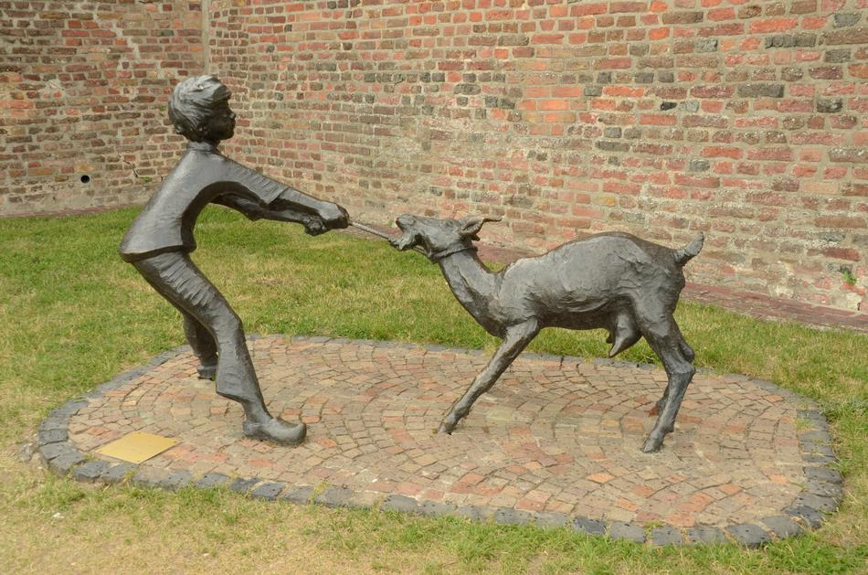 goat and Boy Statues