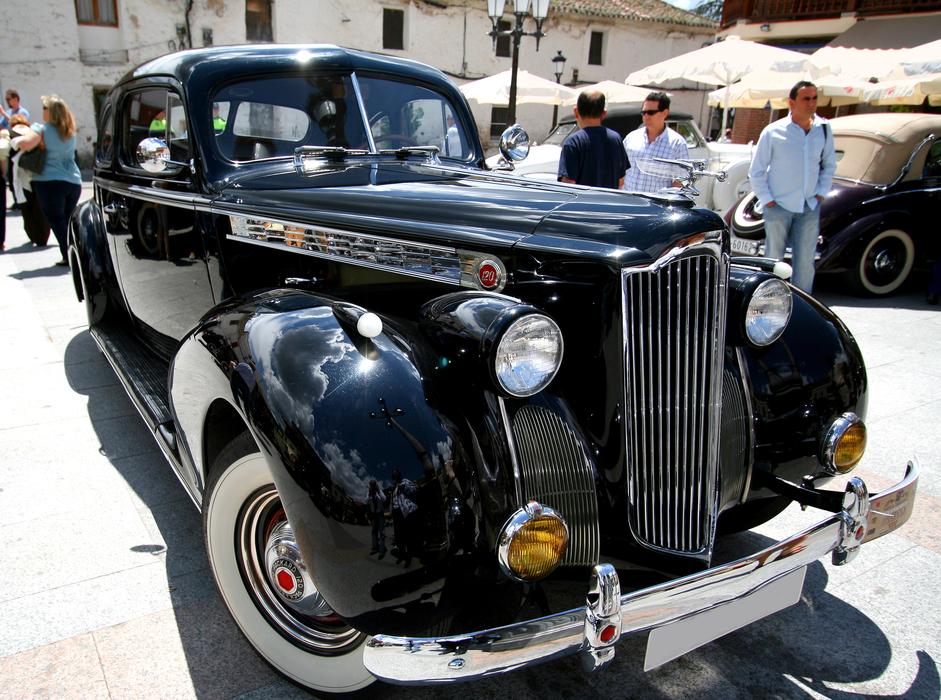 a black old car on display