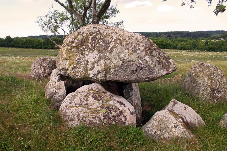 Beautiful landscape with the Dolmen rocks among the colorful plants in Stenvad, Denmark