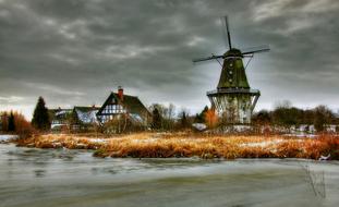 Beautiful and colorful landscape of the coast of Gifhorn, Germany, with the museum with mills, among the plants