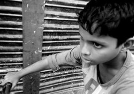 Boy street black white close-up