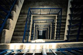 flights of stairs and blue railings