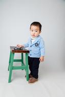 photo of Small Dudes Boy and chair