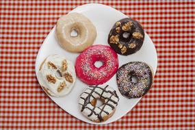 colored doughnuts in a plate