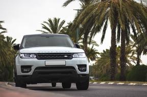 beautiful white car on the road