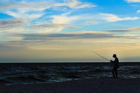 Silhouette Fishing Beach