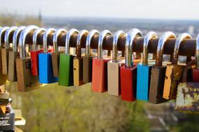 locks colored iron bridge fence