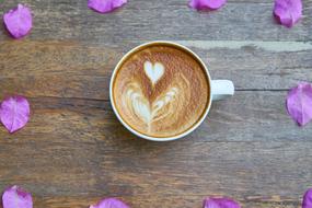 coffee on background of rose petals